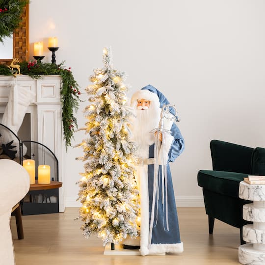 Glitzhome® 3.5ft. Oversized Deluxe Blue Christmas Santa with 4ft Lighted Flocked Artificial Christmas Tree